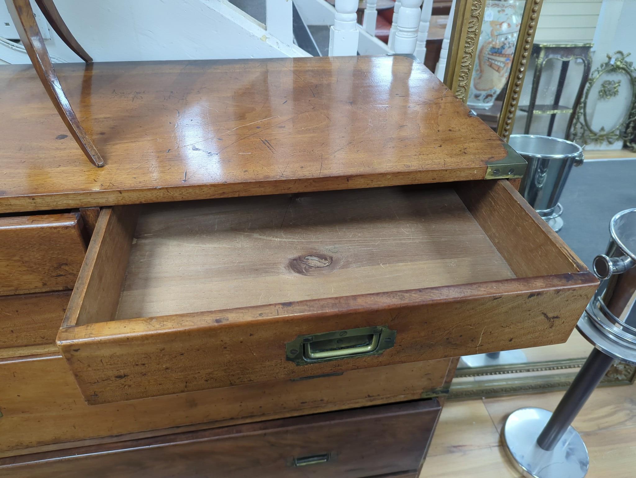 A Victorian brass bound mahogany two part military chest fitted four short and three graduated long drawers width 107cm, depth 45cm, height 109cm.